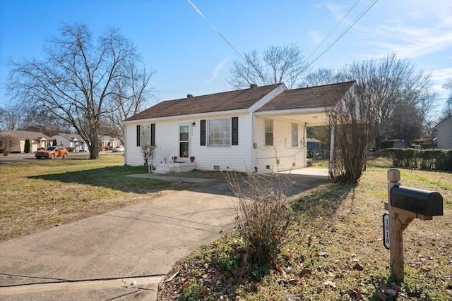 ranch-style home featuring a front yard