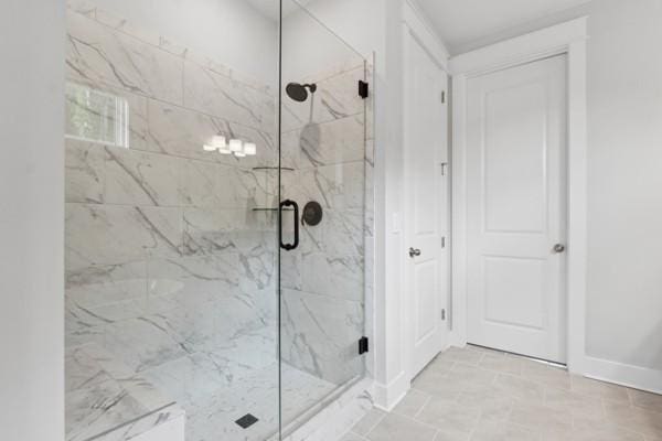 bathroom featuring an enclosed shower