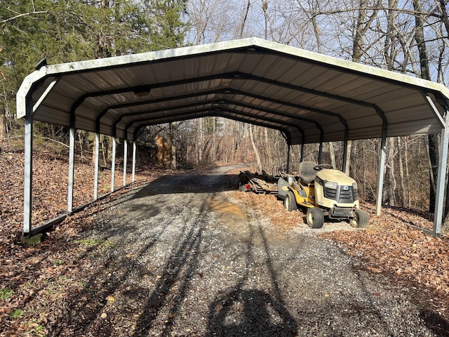 view of parking / parking lot featuring a carport