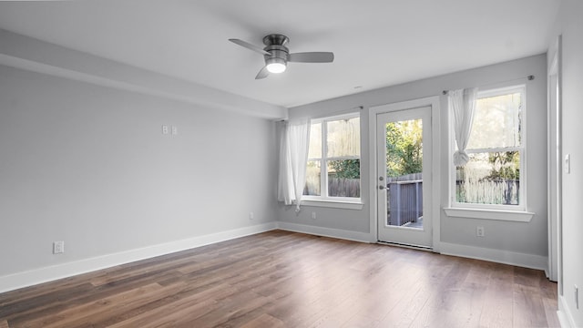 unfurnished room featuring hardwood / wood-style floors and ceiling fan