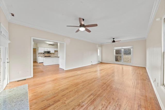 unfurnished living room featuring light hardwood / wood-style flooring, ornamental molding, and ceiling fan