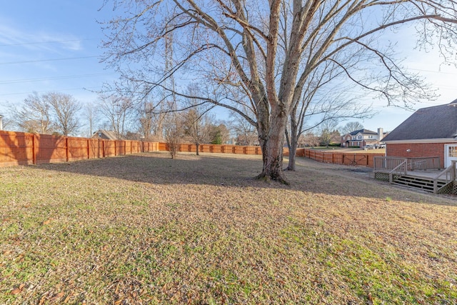 view of yard with a deck