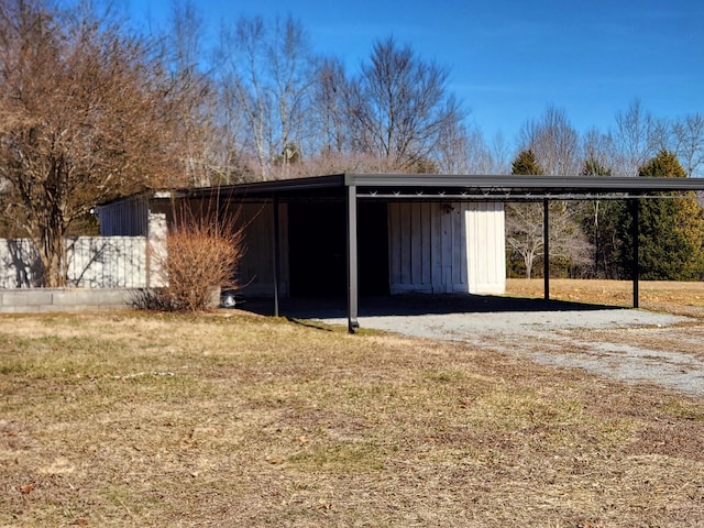 view of outbuilding featuring a yard