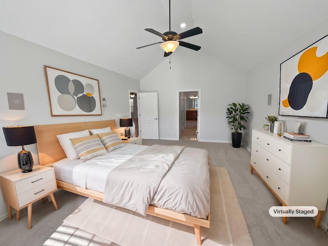 carpeted bedroom with ceiling fan and high vaulted ceiling