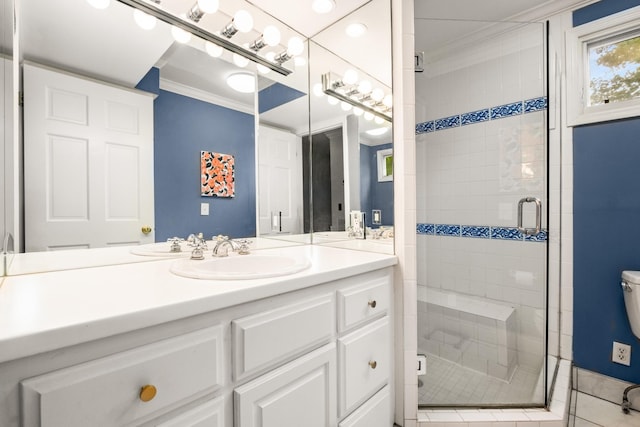 bathroom with toilet, an enclosed shower, ornamental molding, vanity, and tile patterned flooring