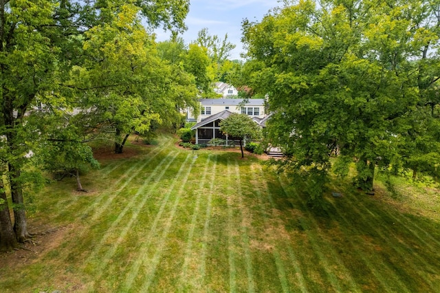 view of yard with a rural view