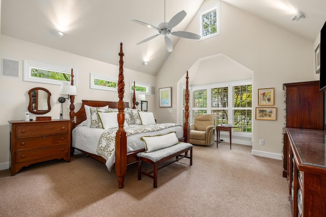 carpeted bedroom featuring ceiling fan, high vaulted ceiling, and multiple windows