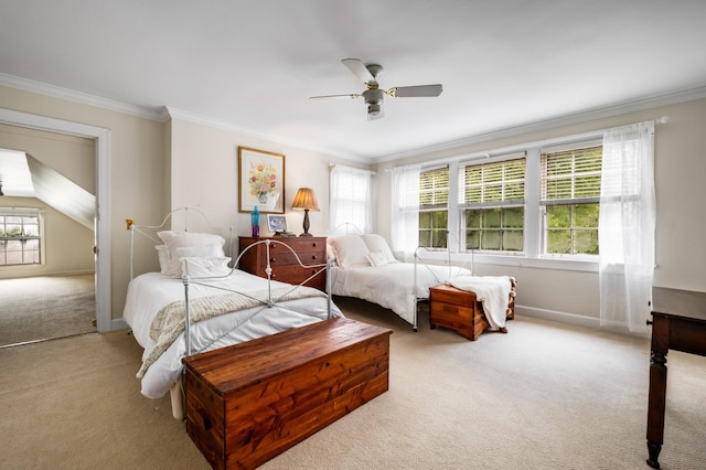 carpeted bedroom with crown molding, ceiling fan, and multiple windows