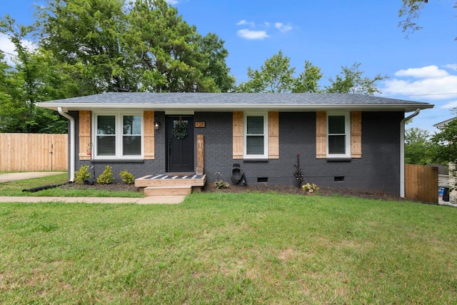 ranch-style house with a front yard