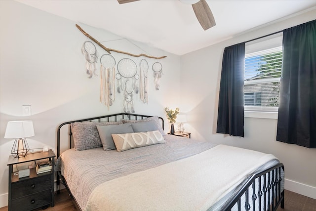 bedroom featuring dark wood-type flooring and ceiling fan