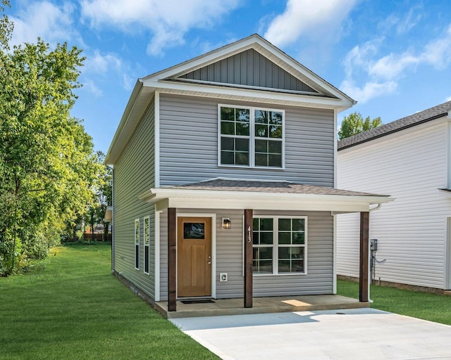 front facade featuring a front yard and a porch