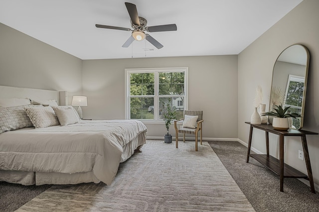 bedroom with ceiling fan and carpet