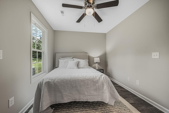 bedroom featuring wood-type flooring and ceiling fan