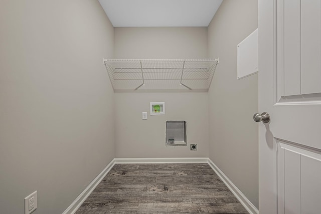 laundry room featuring hookup for a washing machine, dark hardwood / wood-style floors, and hookup for an electric dryer