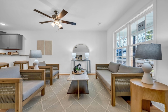 living room featuring ceiling fan