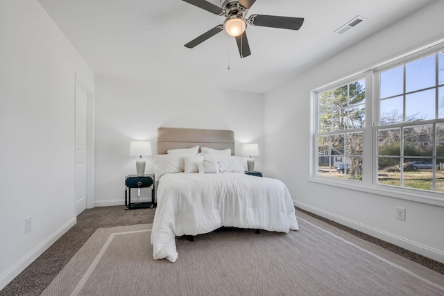 carpeted bedroom with ceiling fan