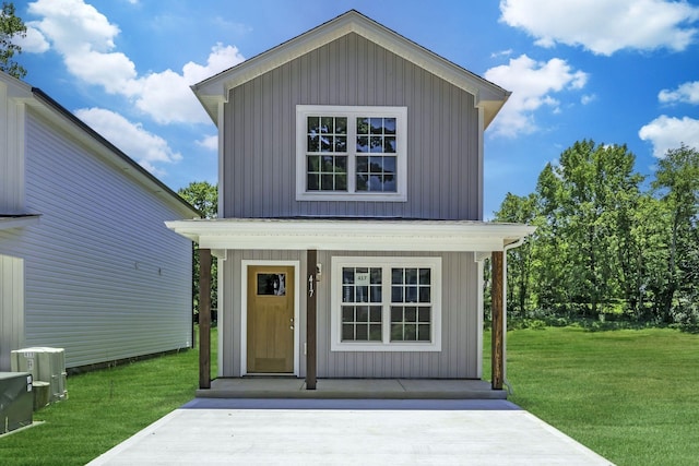 view of outbuilding with a lawn