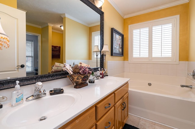 bathroom featuring crown molding, vanity, a bath, a textured ceiling, and tile patterned floors