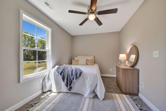 carpeted bedroom with ceiling fan