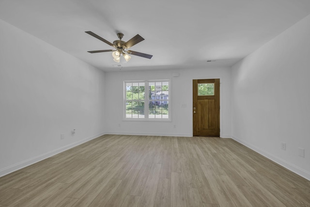 interior space with ceiling fan and light hardwood / wood-style flooring