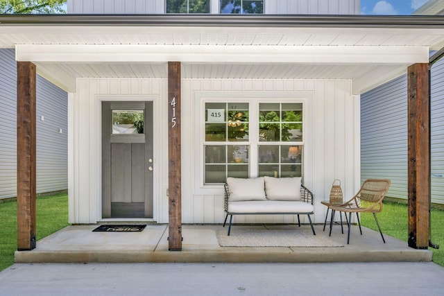 property entrance featuring a porch