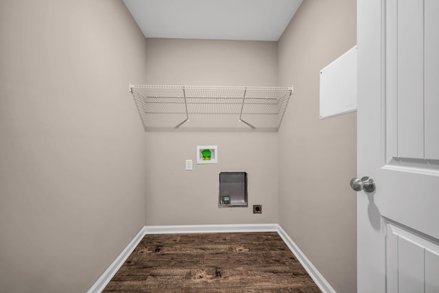 clothes washing area featuring dark wood-type flooring, washer hookup, and electric dryer hookup