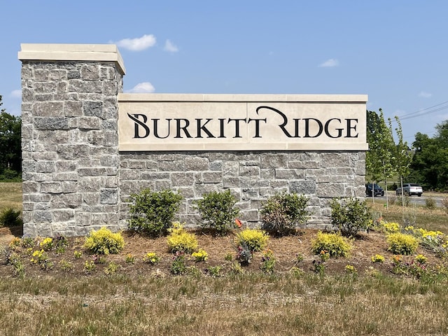 view of community sign