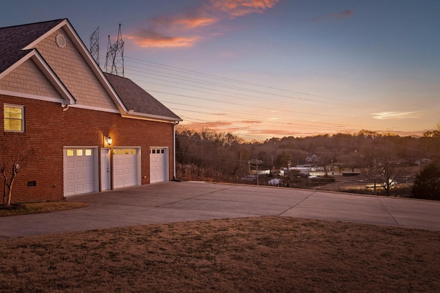 exterior space with a garage