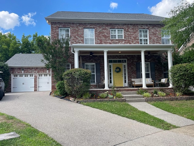 view of front facade with a garage and covered porch