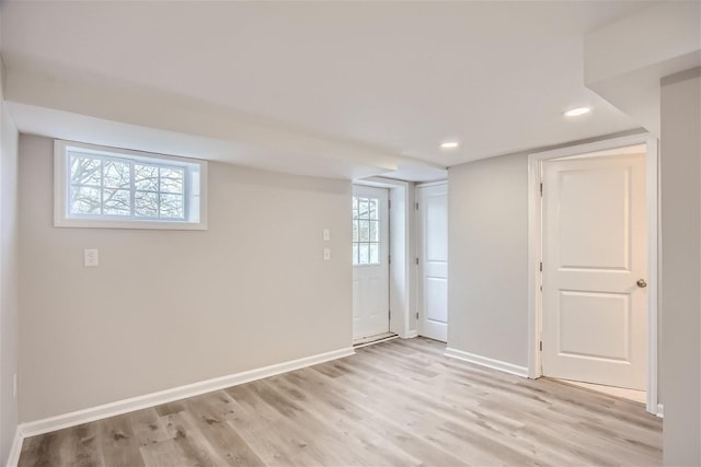 basement with light wood-type flooring