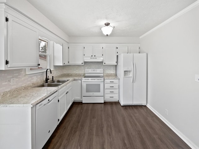 kitchen featuring white cabinetry, sink, white appliances, and decorative backsplash