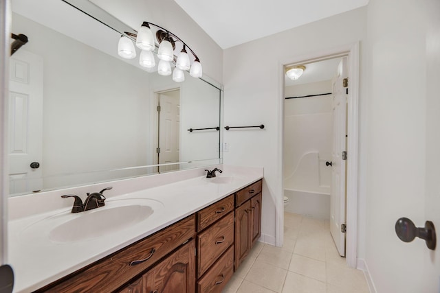 full bathroom featuring tile patterned flooring, vanity, washtub / shower combination, and toilet