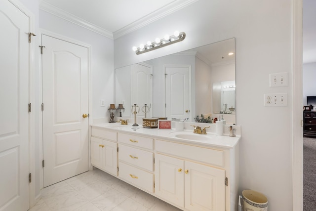 bathroom with crown molding and vanity