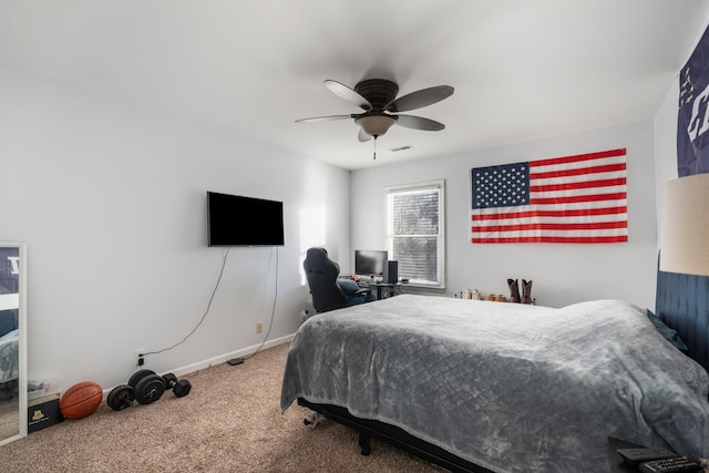 carpeted bedroom featuring ceiling fan