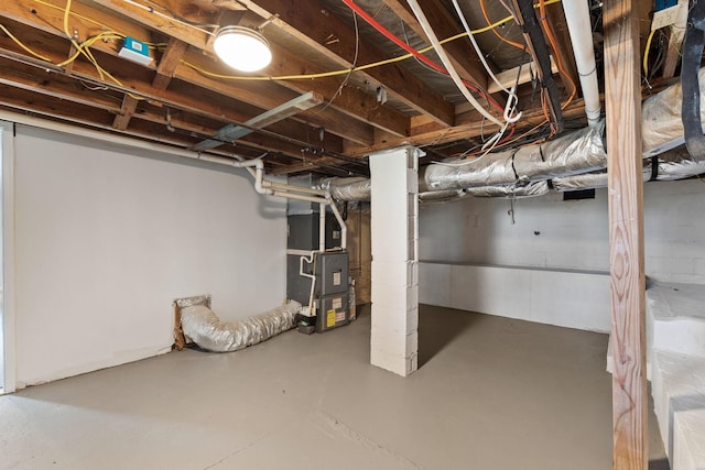 basement featuring heating unit