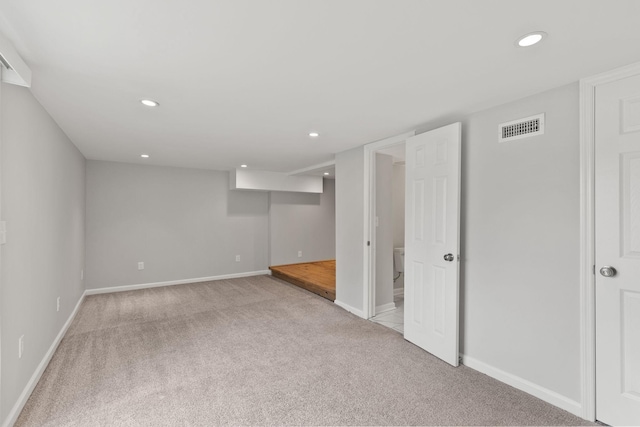 basement with light carpet