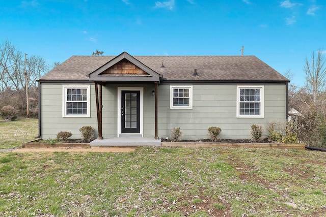 view of front of property with a front lawn