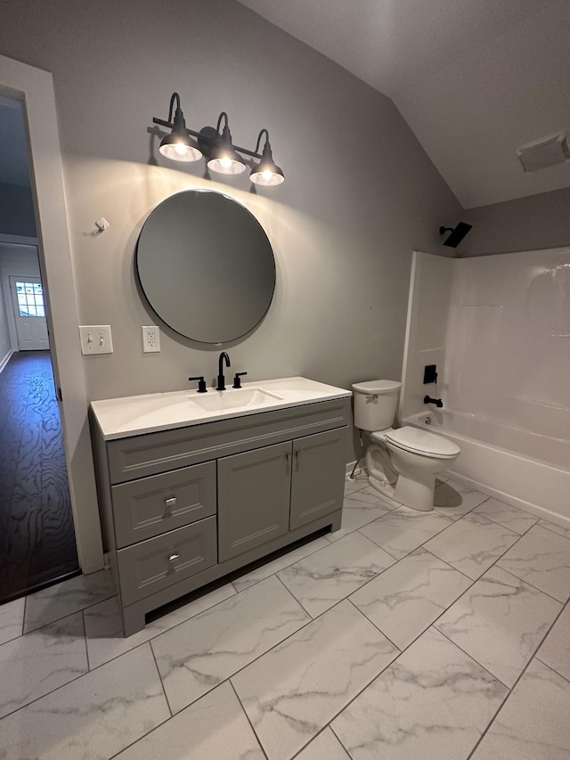 full bathroom with lofted ceiling, toilet, shower / bath combination, and vanity