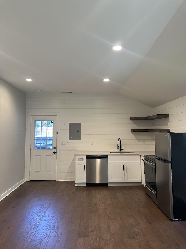 kitchen featuring white cabinetry, sink, dark hardwood / wood-style floors, and appliances with stainless steel finishes