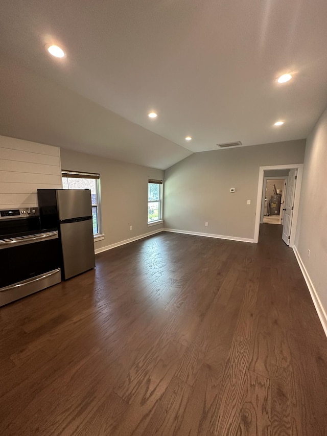 living room featuring lofted ceiling and dark hardwood / wood-style floors