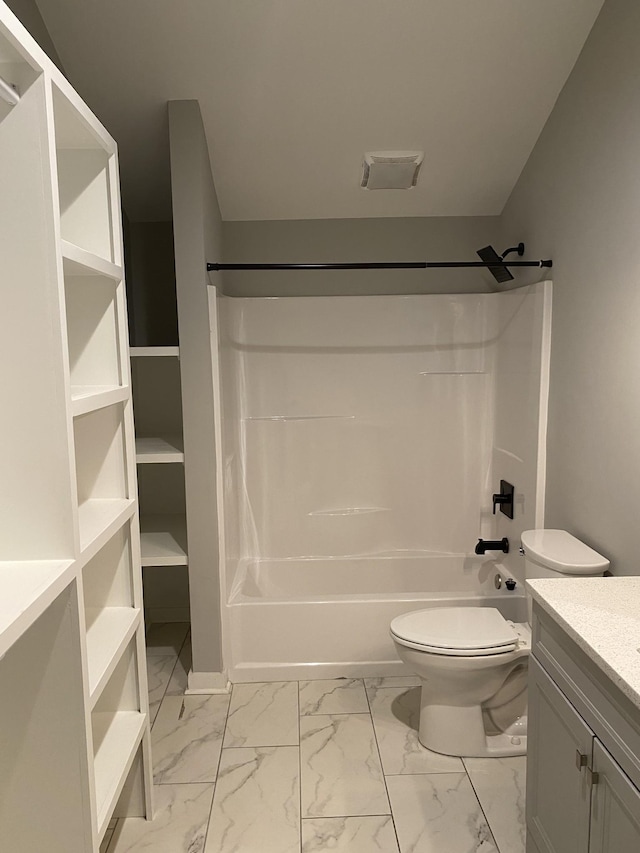 full bathroom with toilet, vanity, and bathtub / shower combination