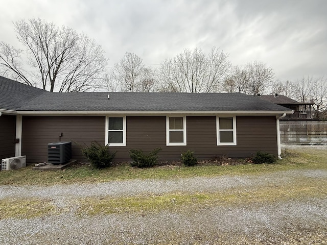 view of home's exterior with ac unit and central AC