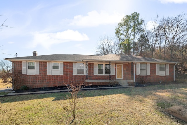 ranch-style house with a front lawn