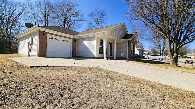 view of side of home featuring a garage