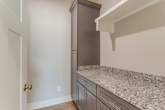 bathroom with wood-type flooring and vanity