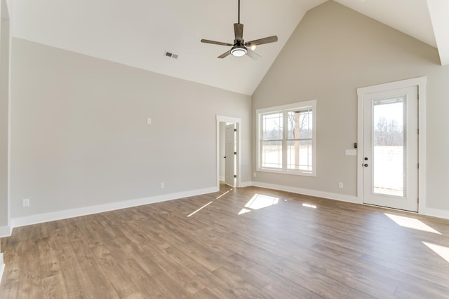 unfurnished room featuring ceiling fan, high vaulted ceiling, and light hardwood / wood-style floors