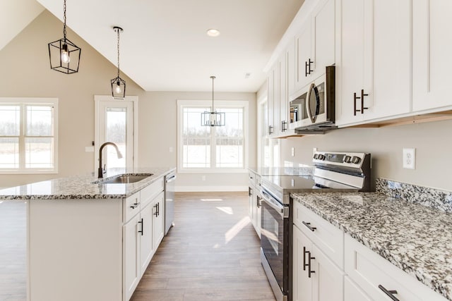 kitchen with white cabinetry, sink, and stainless steel appliances