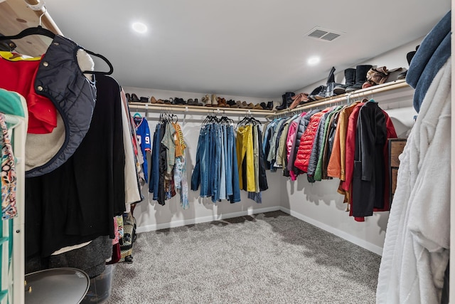 spacious closet featuring carpet floors