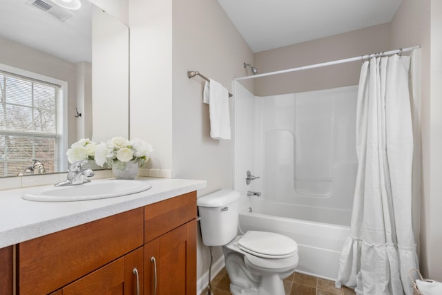 bathroom with visible vents, toilet, shower / tub combo with curtain, tile patterned flooring, and vanity