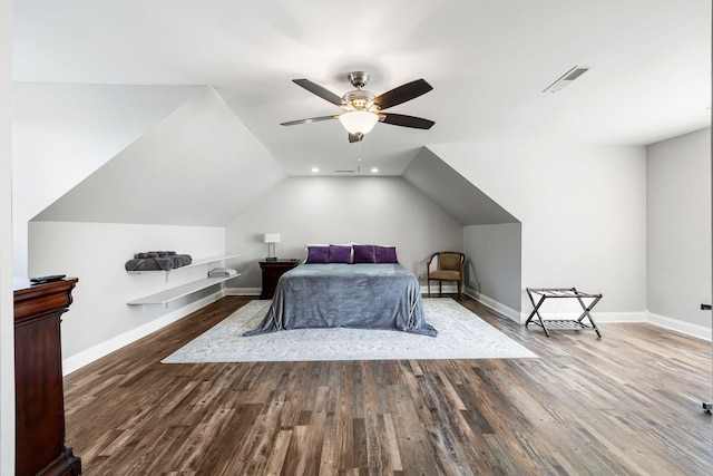 bedroom featuring hardwood / wood-style flooring, vaulted ceiling, and ceiling fan